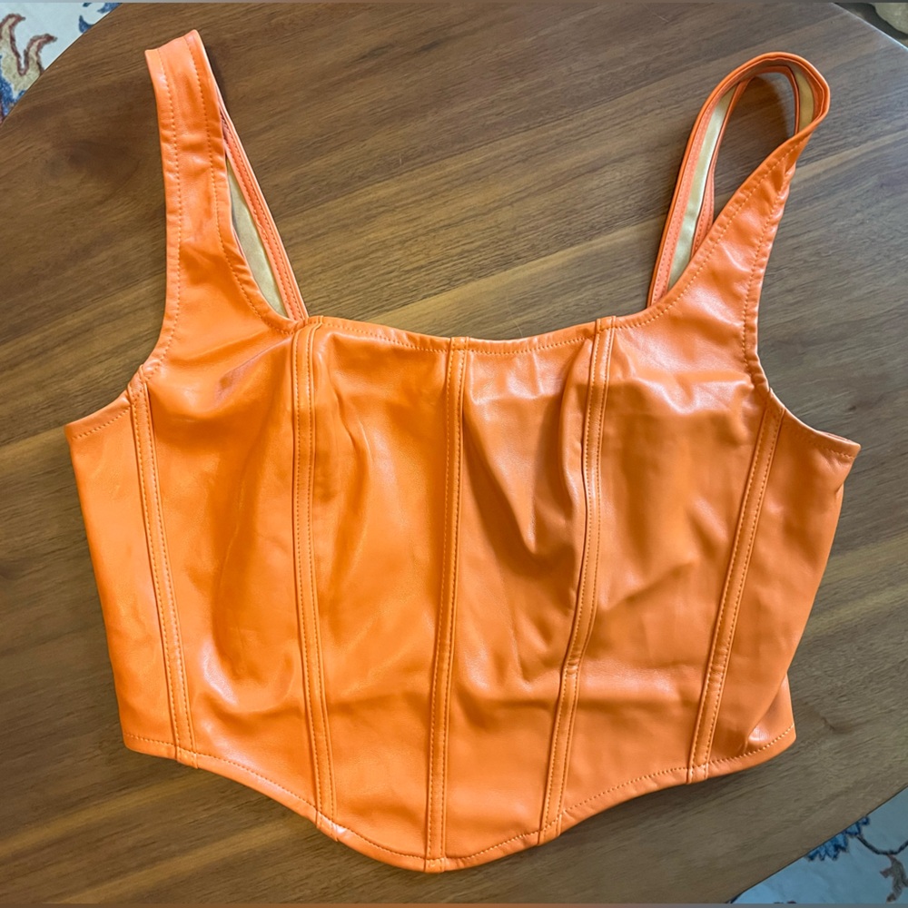 Orange faux leather going out top